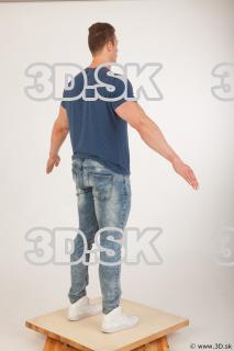 Whole body blue tshirt light blue jeans modeling a pose…